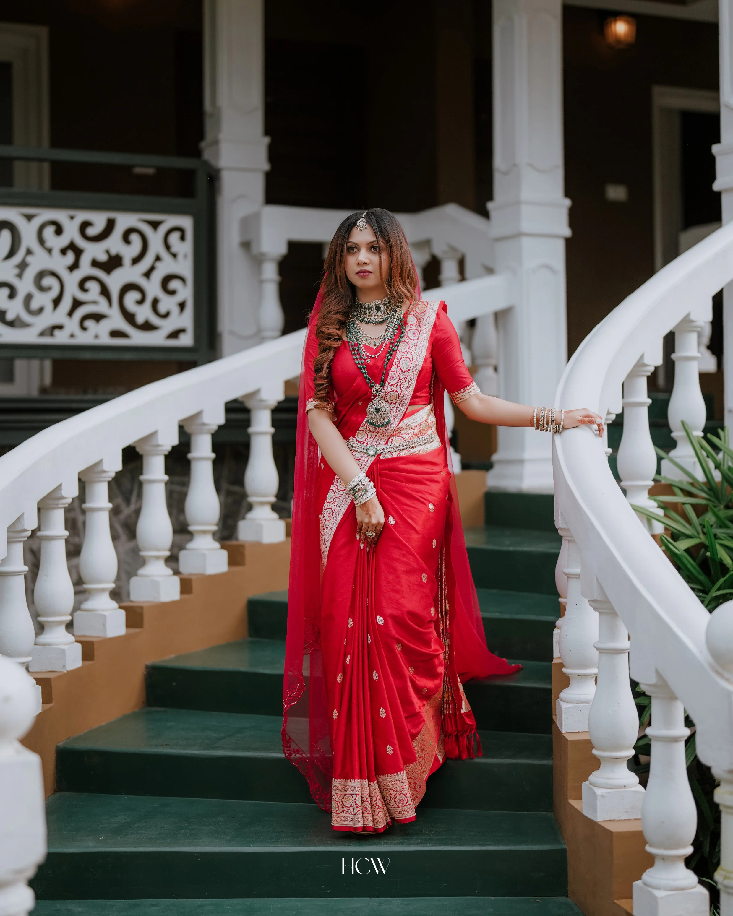 Bride arriving at a classic wedding venue