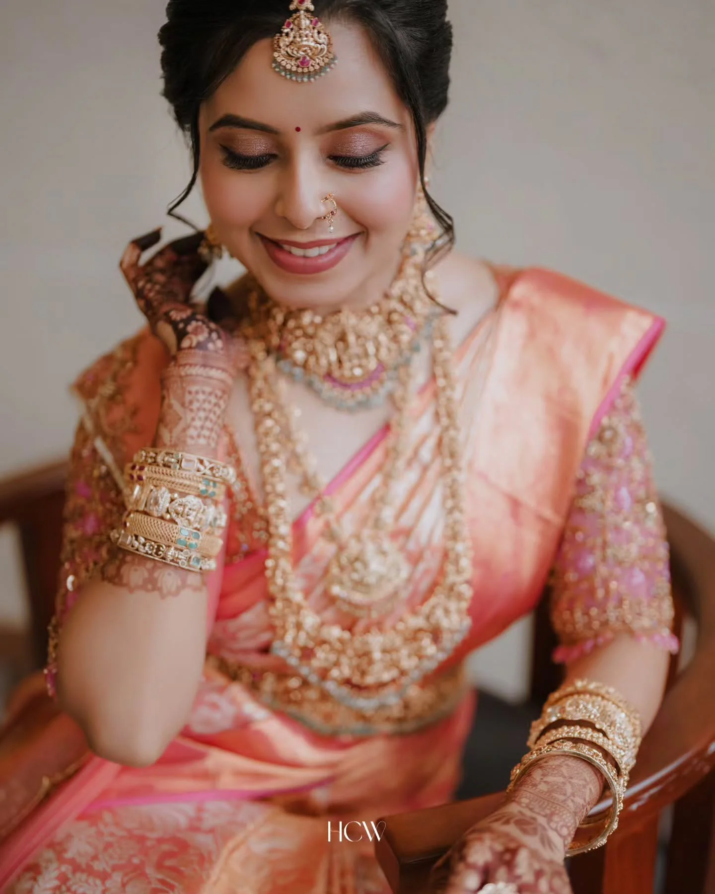 Bride smiling in traditional wedding attire